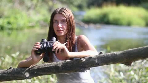 Girl, binoculars Stock Footage