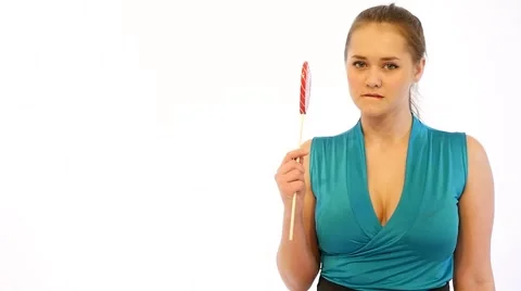 Girl Bites Candy Stock Footage 59538259