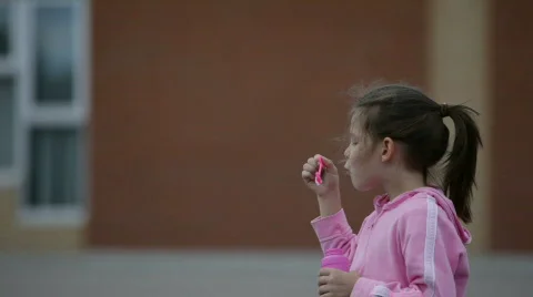  Girl Blowing Bubbles  Video stock 765802