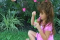 Girl Blowing Bubbles Footage