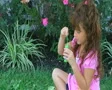 Girl Blowing Bubbles SD Footage