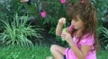 Girl Blowing Bubbles HD Footage