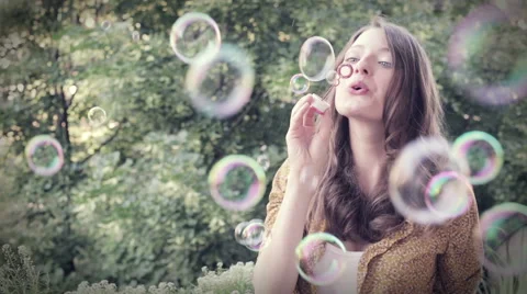 Girl Blowing Bubbles Stock Footage 44559261