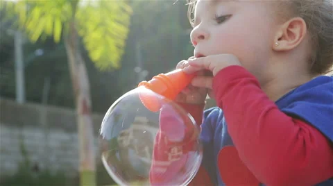 Girl is blowing Soap Bubble 스톡 동영상 51744849