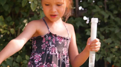 Girl blows bubbles Stock Footage 45329046