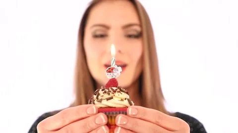 Girl Blows Out Candle on Pancake Stock Footage 59190432