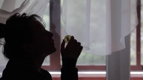 Girl blows soap bubbles Stock Footage 74599852