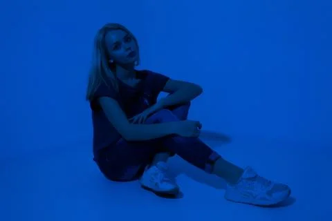 Girl on blue background 스톡 사진