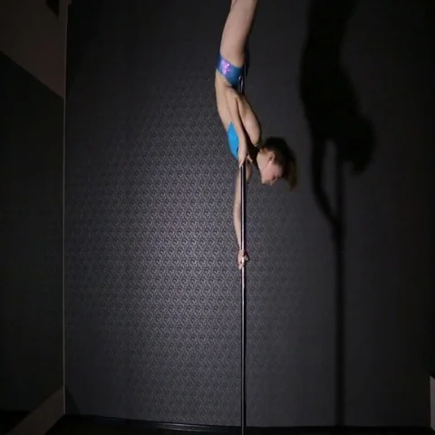 Girl in blue dancing pole dance Stock Footage 69501386