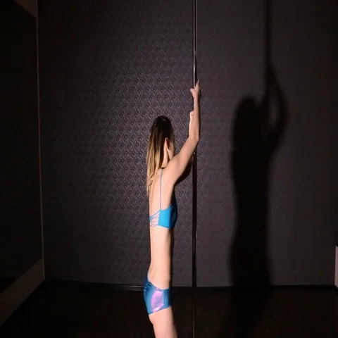 Girl in blue dancing pole dance Stock Footage 69501509