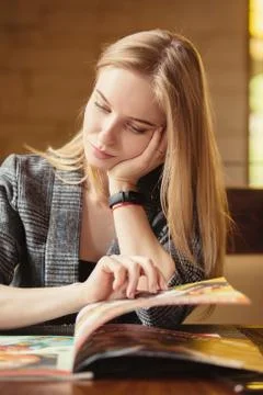 Girl with booklet Foto stock
