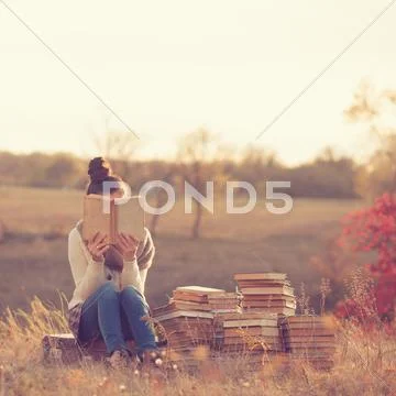 Girl with books Stock Photos