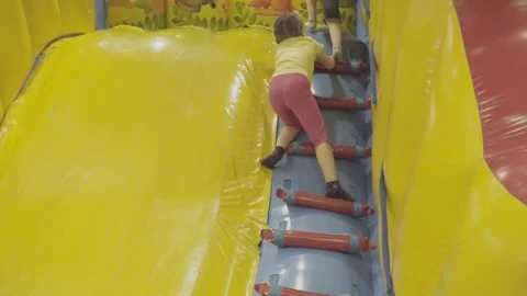 Girl with boy playing Video stock 79785978
