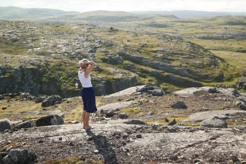Girl breathing fresh air in north mountains Stock Photos