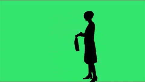 Girl with a briefcase looking at the clock video silhouette Stock Footage 50398318