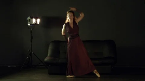 Girl in brown is a beautiful dancer Stock Footage 86491702