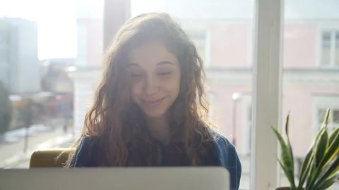 Girl browsing the laptop. Video stock 86592480