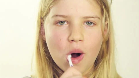 Girl brushing her teeth Stock Footage 60099387