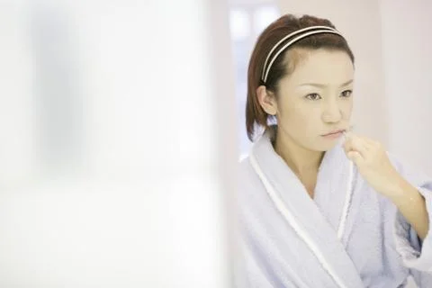 Girl Brushing Teeth Stock Photos