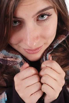 Girl bundling up her jacket Stock Photos