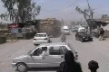 Girl in Burqa Watching Traffic in FATA Footage