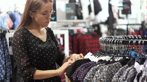 A girl buying in shoping centre Stock Footage 66464689