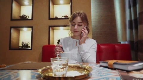 Girl in a cafe Stock Footage 72277169