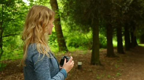 Girl with a camera Stock Footage 11059222