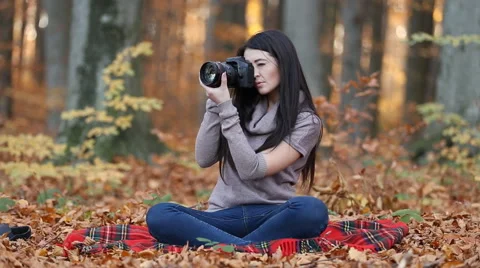 Girl with camera Stock Footage 56961190