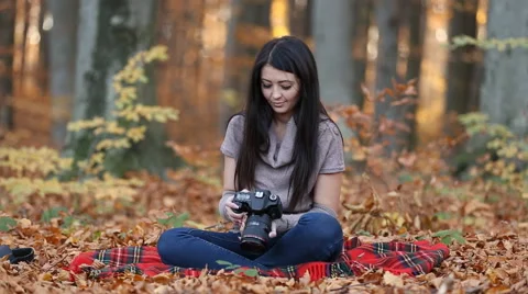 Girl with camera Stock Footage 57393526