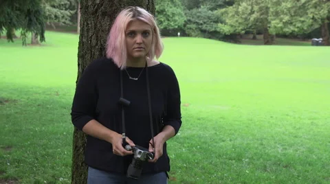 Girl with camera Stock Footage 65781793