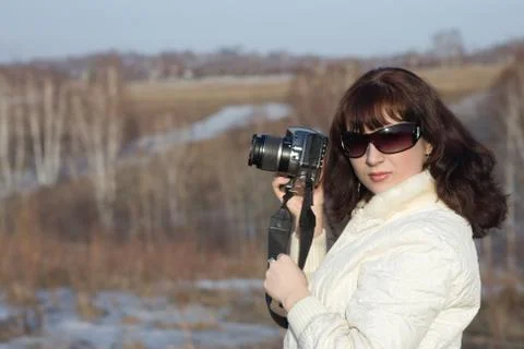 Girl with the camera Foto stock