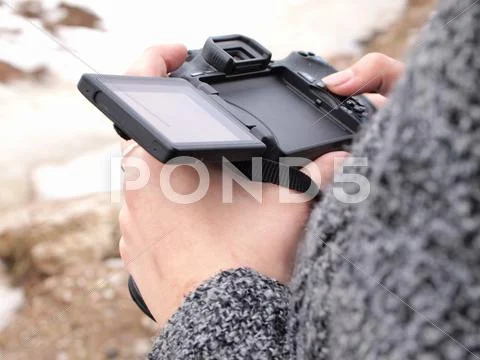Girl with a camera Stock Photos