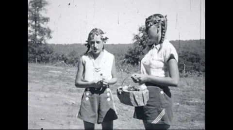 Girl campers at campsite Stock Footage