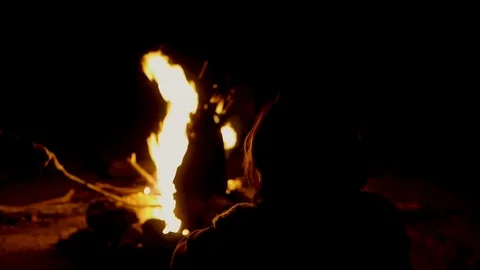 Girl on campfire Stock Footage 79097013