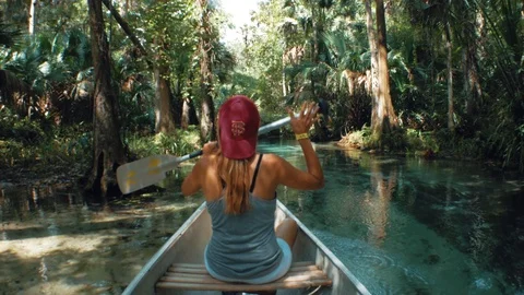 Girl Canoeing Florida Springs River Stock Footage
