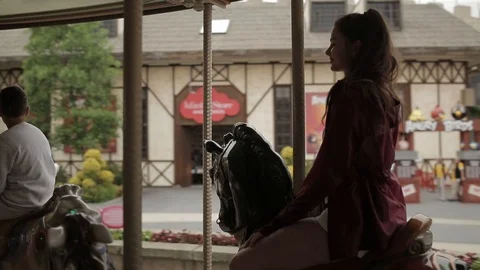 Girl on the carousel Stockbeeldmateriaal 110814844