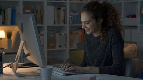 Girl chatting at night with her computer Stock Footage 89647666