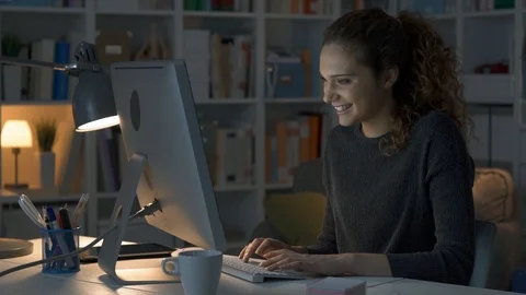 Girl chatting at night with her computer Stock Footage 89647719