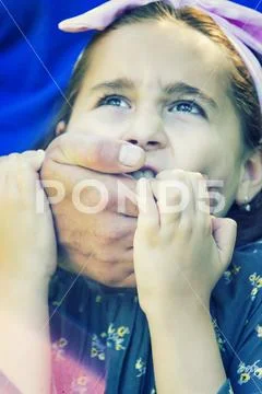 Girl child in danger, violence Stock Photos