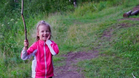 Girl child enjoys outdoor recreation. Stock Footage