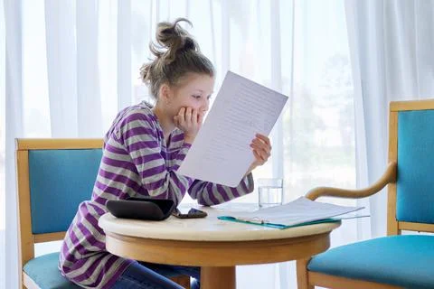 Girl child of pre-adolescent age in office of therapist, social worker, teacher Stock Photos