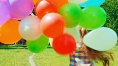 A red yellow balloon tied to a string fl, Stock Video