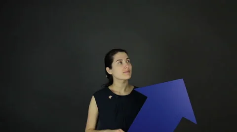 Girl Chooses Between Two Objects. Stock Footage 62061437