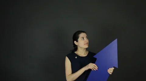 Girl Chooses Between Two Objects. Stock Footage 62061453