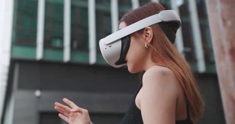 Girl in the city centre using virtual reality glasses Stock Footage 201680966