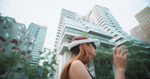 Girl in the city centre using virtual reality glasses Stock Footage 201687090