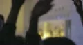 Girl clapping hands in the air, to the rhythm of dance floor music. HD Footage