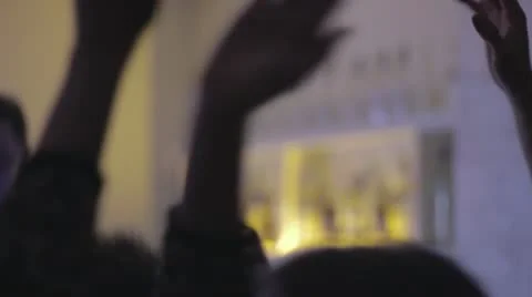 Girl clapping hands in the air, to the rhythm of dance floor music. Stock Footage