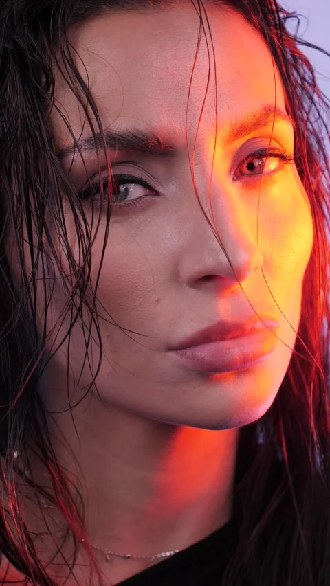 Girl close-up in red light Stock Footage 264226724